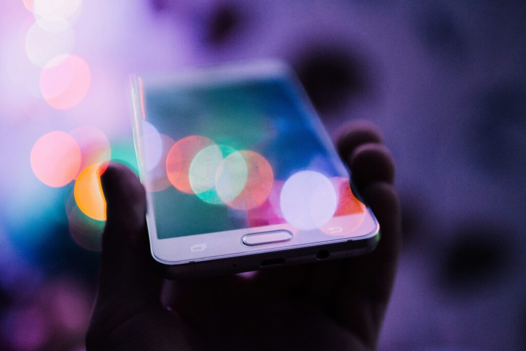 Picture of a smart phone being held in one hand