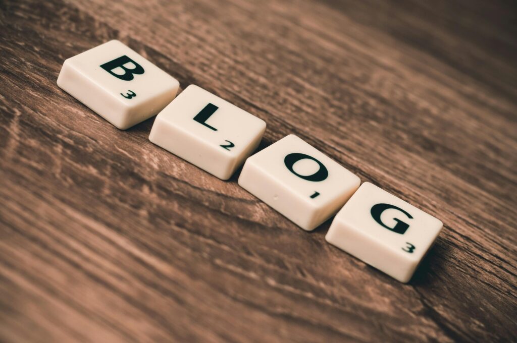 Image of 4 tiles spelling out "BLOG"