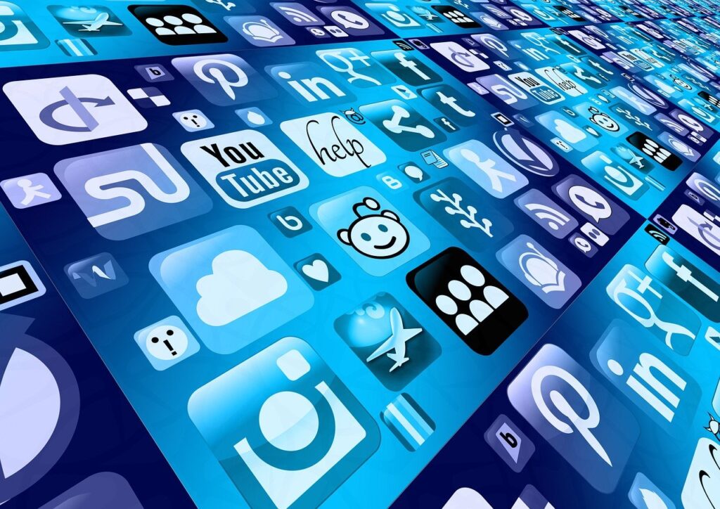 Image of different apps of all kinds displayed on a blue toned screen.